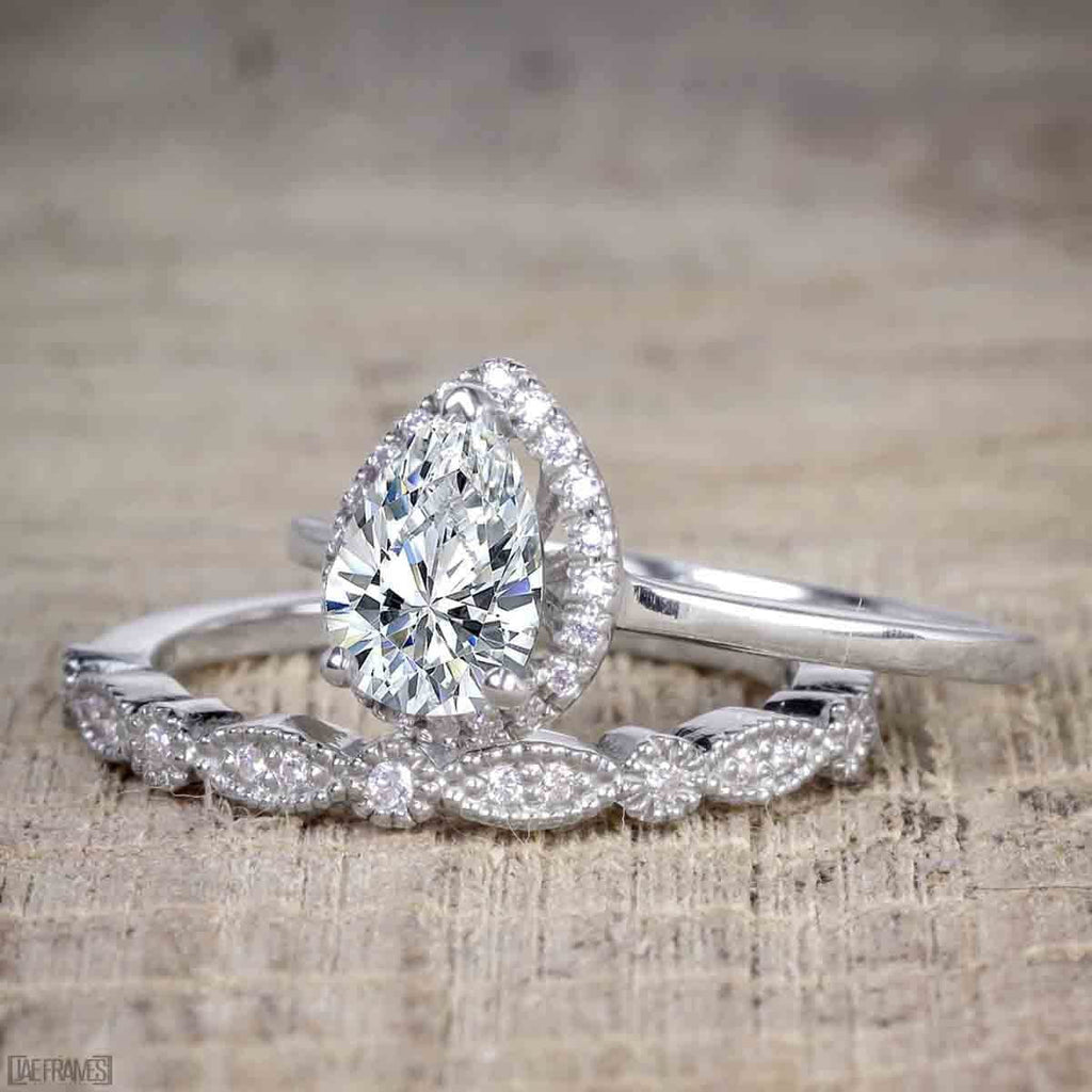Pear Cut Moissanite and Diamond Halo Wedding Ring Set in White Gold Q9746