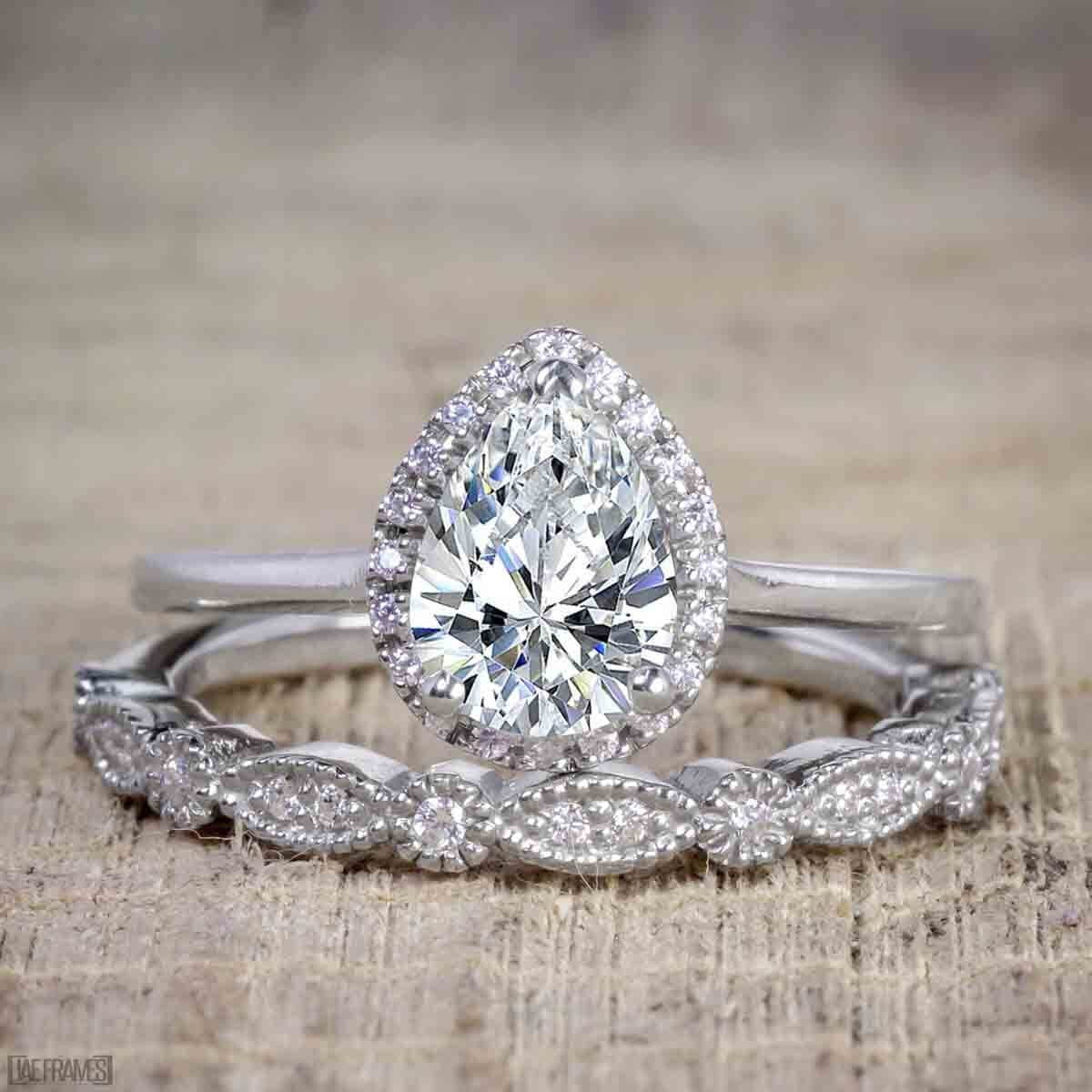 Pear Cut Moissanite and Diamond Halo Wedding Ring Set in White Gold Q9746