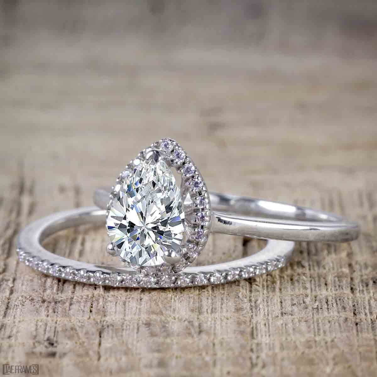 Pear Cut Moissanite and Diamond Halo Wedding Ring Set in White Gold Q9746